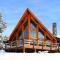 Деревянный дом шале из оцилиндрованного бревна: проекты и цены