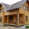 Двухэтажные деревянные дома из бревна под ключ: проекты и цены